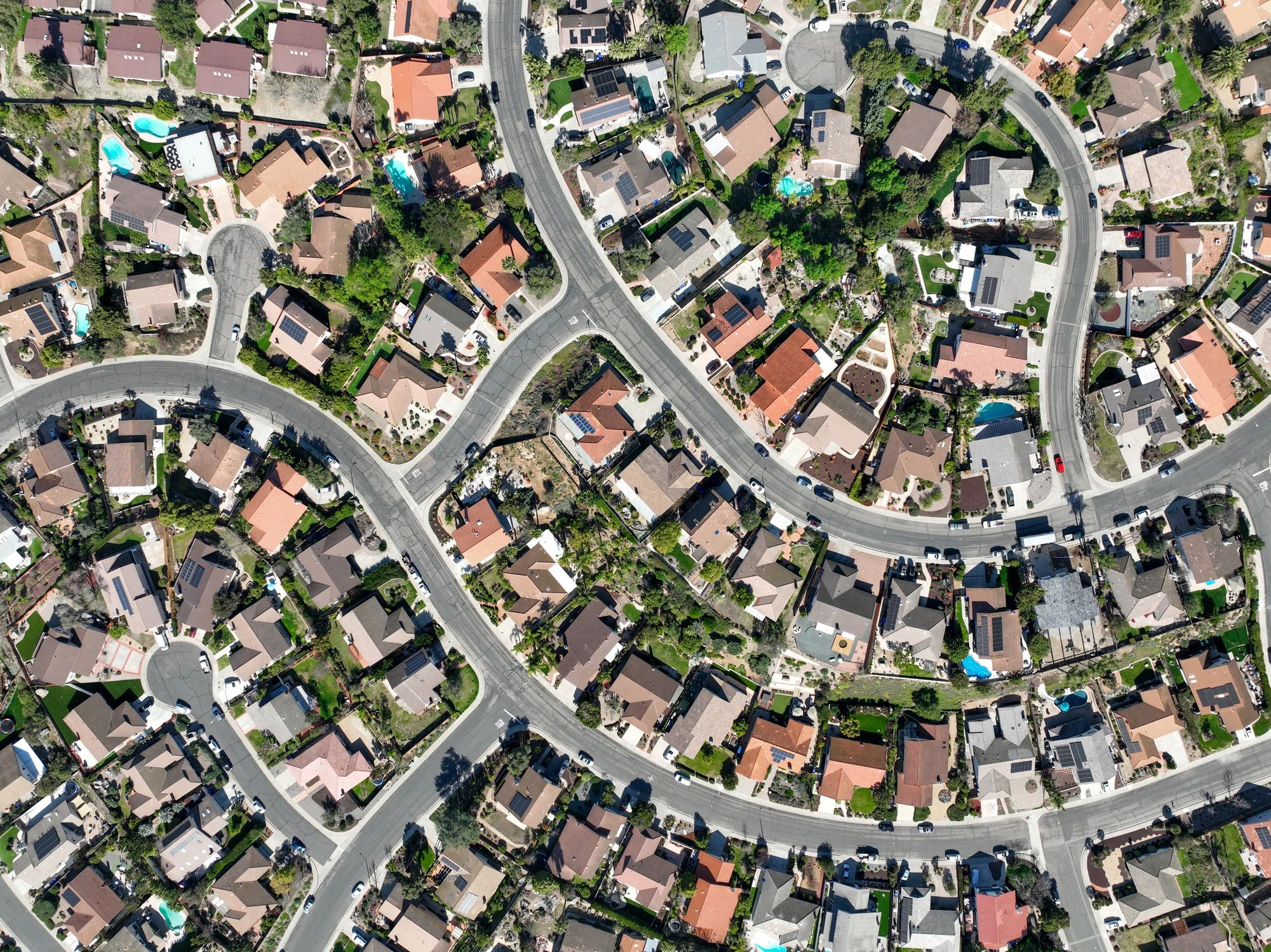 Aerial view of Boise suburban neighborhood, highlighting local real estate expertise and valuations for inherited property and estate sales.