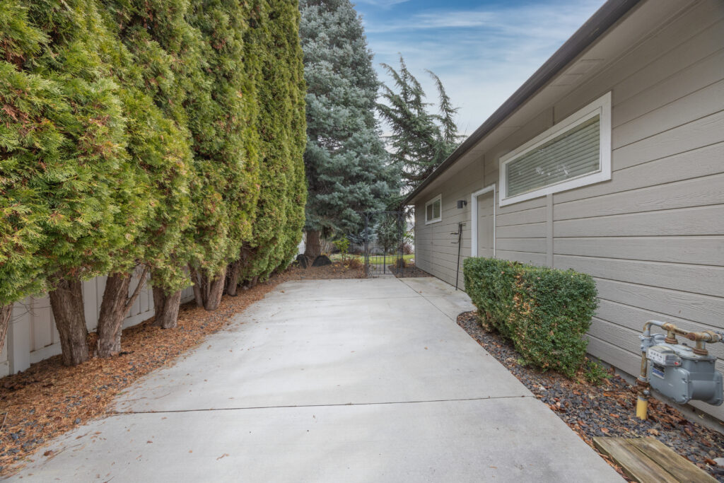 Side yard view featuring RV / boat / toy parking pad at 2680 south loftus way in meridian, idaho listed by jeff sudmeier with idahoreal.estate team at action real estate.